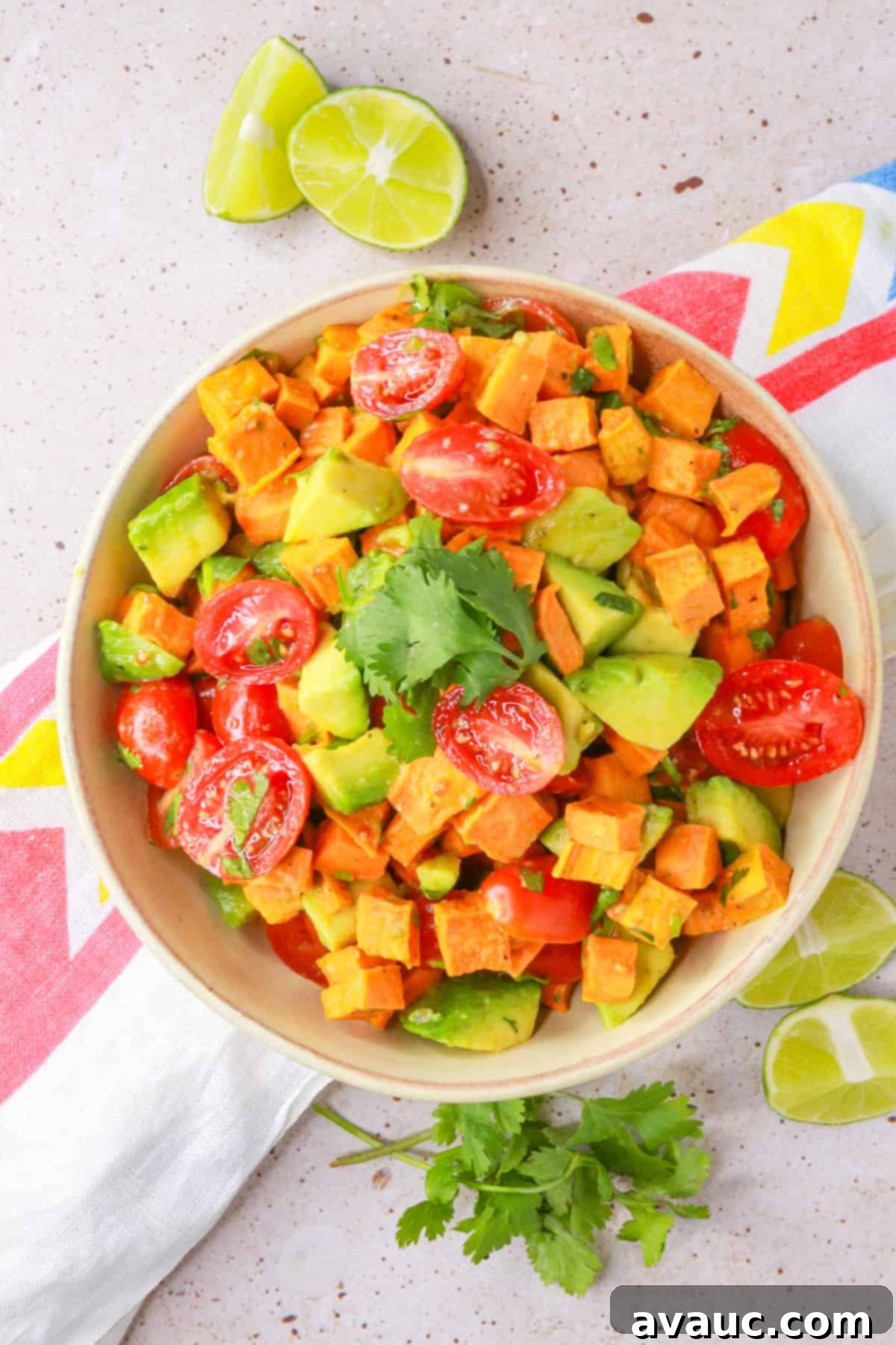 Sweet Potato Avocado Salad 2 Top view of a bowl of ensalada de camote, a vibrant Mexican sweet potato and avocado salad