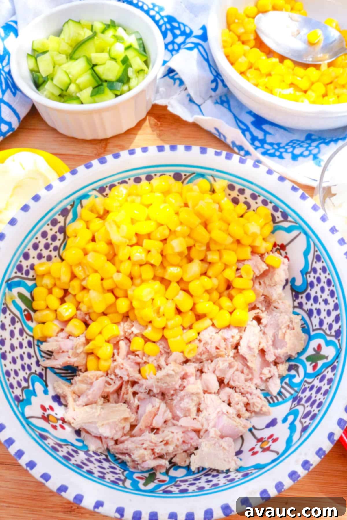 Bowl with canned corn and tuna.