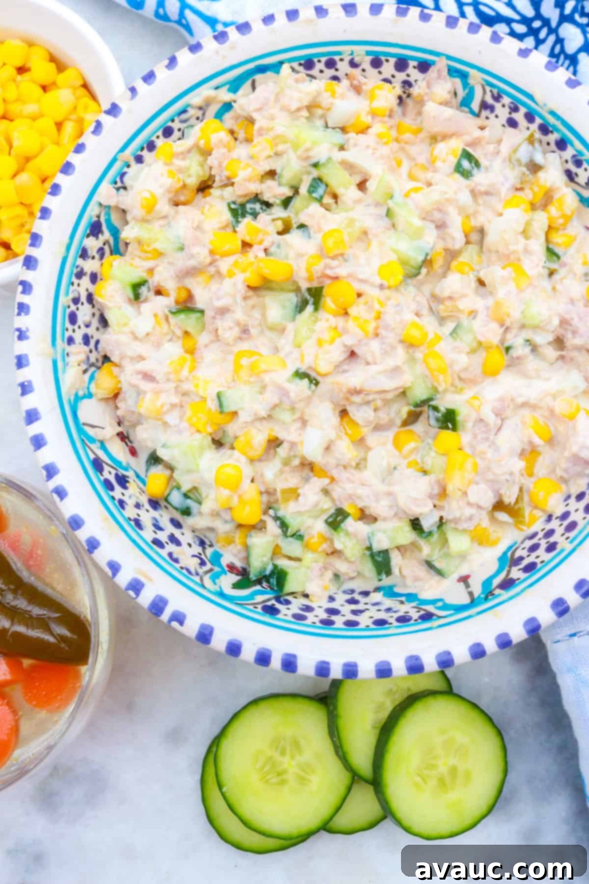 Plated Mexican tuna salad with fresh cilantro and a lime wedge.