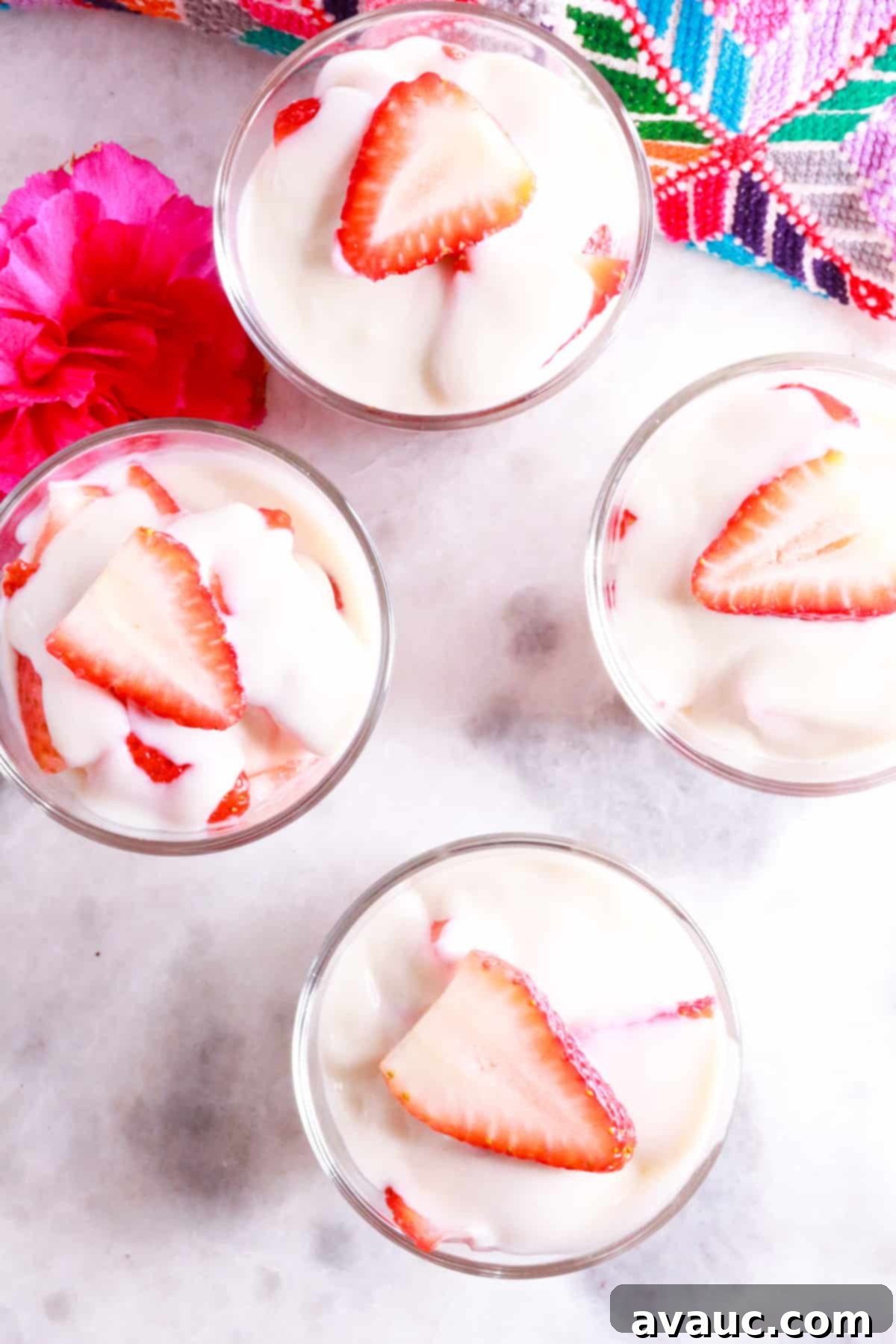 Vegan Strawberry Dream 10 Shot from above of four glasses with fresas con crema