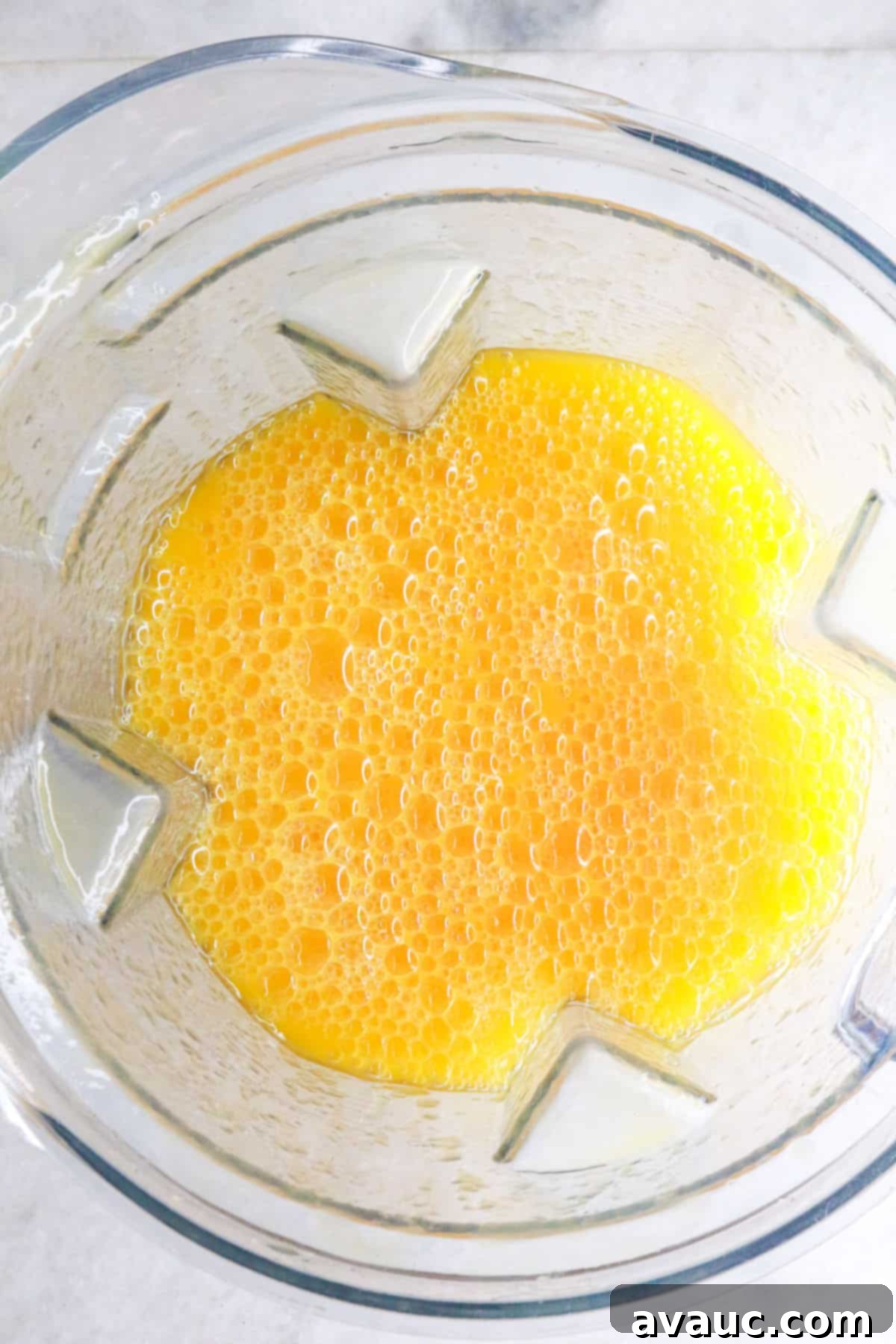 Simple Refreshing Mango Agua Fresca 6 Birds eye view of a blender with agua de mango