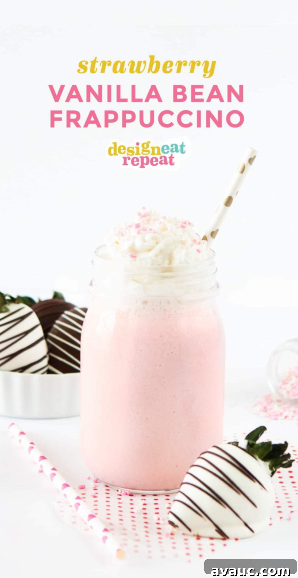 Strawberry Cream Vanilla Bean Frappuccino in a tall glass with whipped cream topping