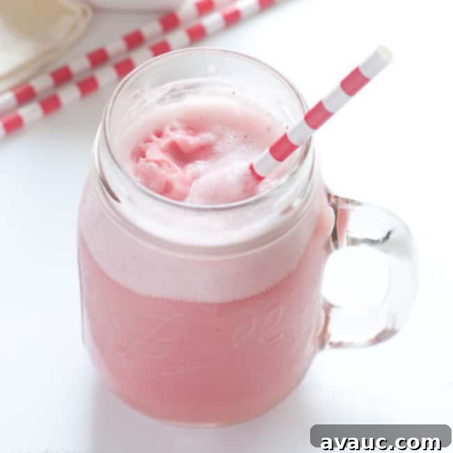 Raspberry Sherbet Punch, a bright pink fizzy and fruity drink