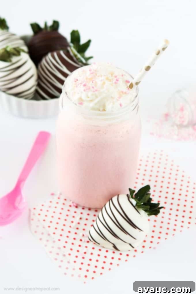 Strawberry Cream Vanilla Bean Frappuccino - a fun, vibrant pink drink perfect for summer or Valentine's Day!