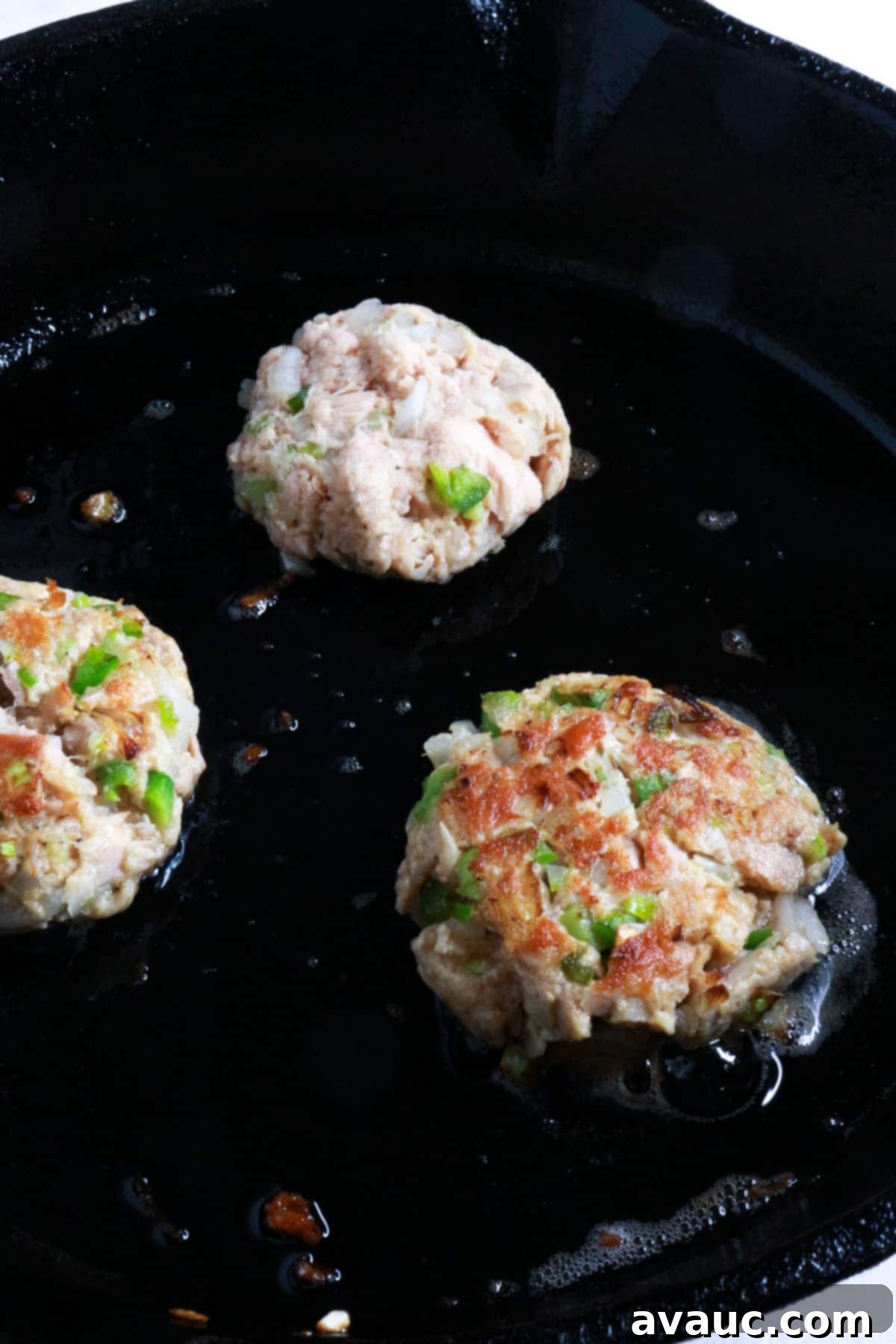 Mexican Tuna Croquettes 7 Tuna patties in a frying pan
