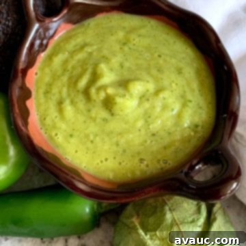 Freshly made creamy tomatillo avocado salsa in a bowl