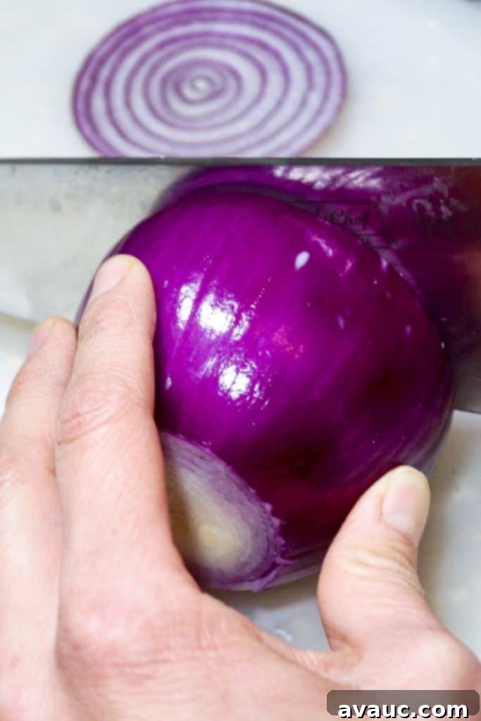 Craft Your Own Cough Syrup 3 Slicing a red onion for homemade cough syrup