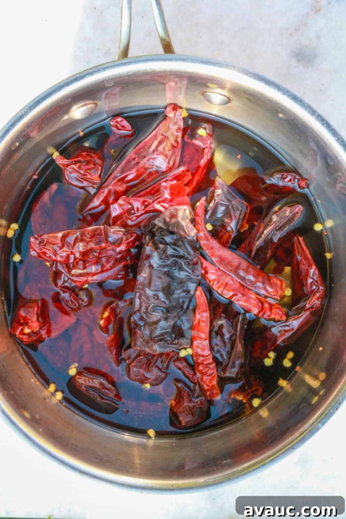 Smoky Guajillo Enchilada Sauce 4 dried chiles in water in a saucepan