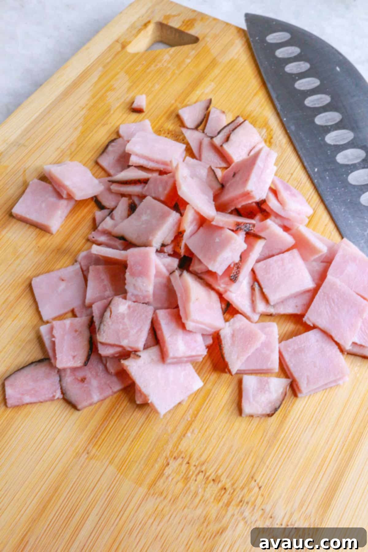 Classic Ham and Egg Scramble 4 Diced ham on a cutting board