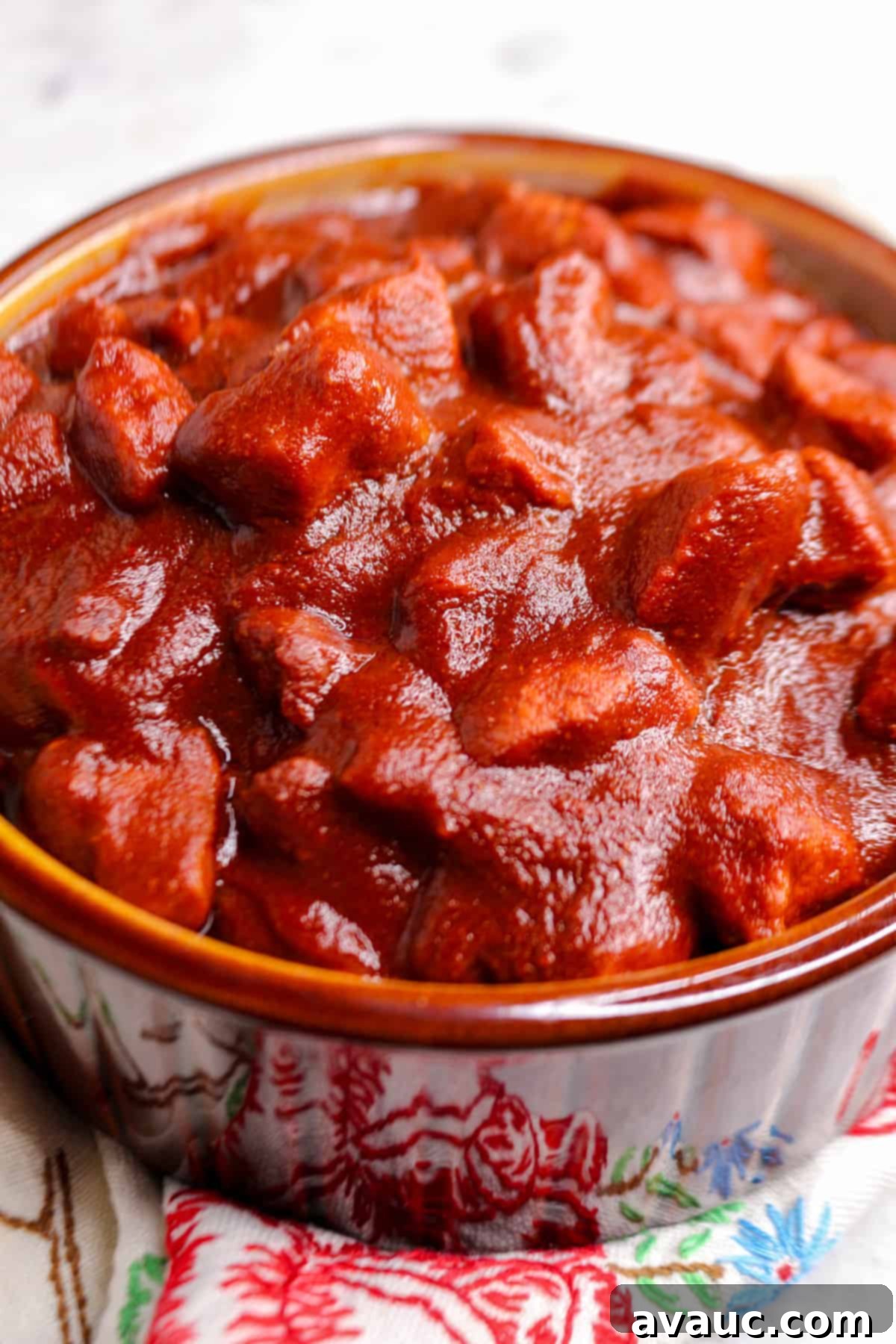 Slow-Cooked Red Chile Pork 10 Close-up shot of a bowl filled with asado de puerco