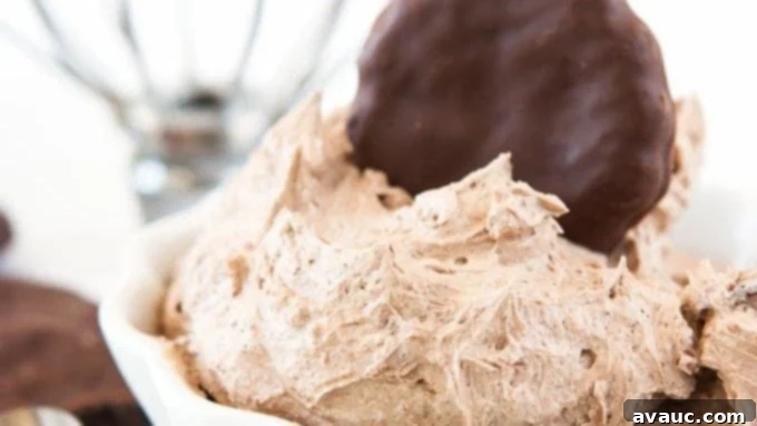 A close-up of the smooth, mint-infused chocolate buttercream texture.