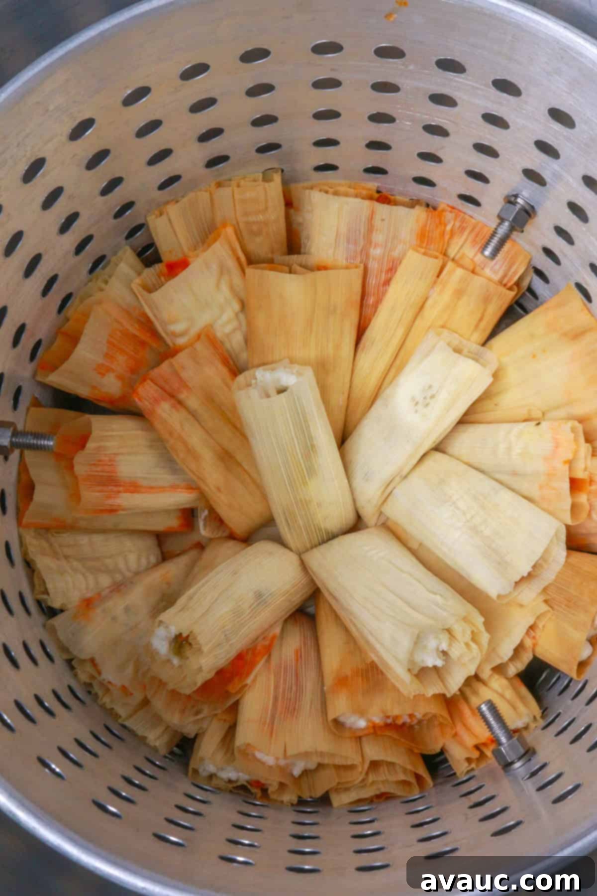 Tamal steamer pot full of tamales ready to be steamed