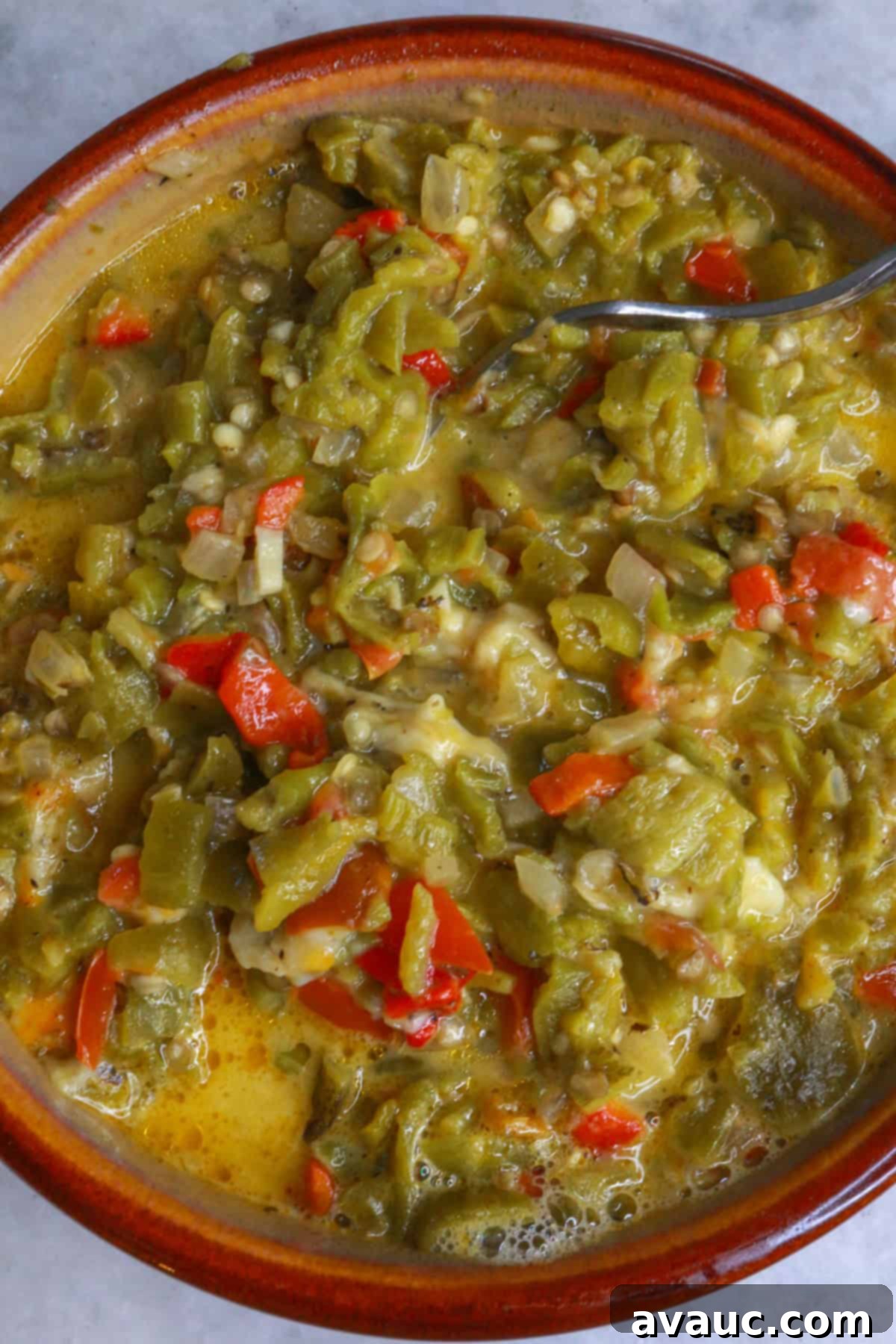 A bowl of green chile and cheese