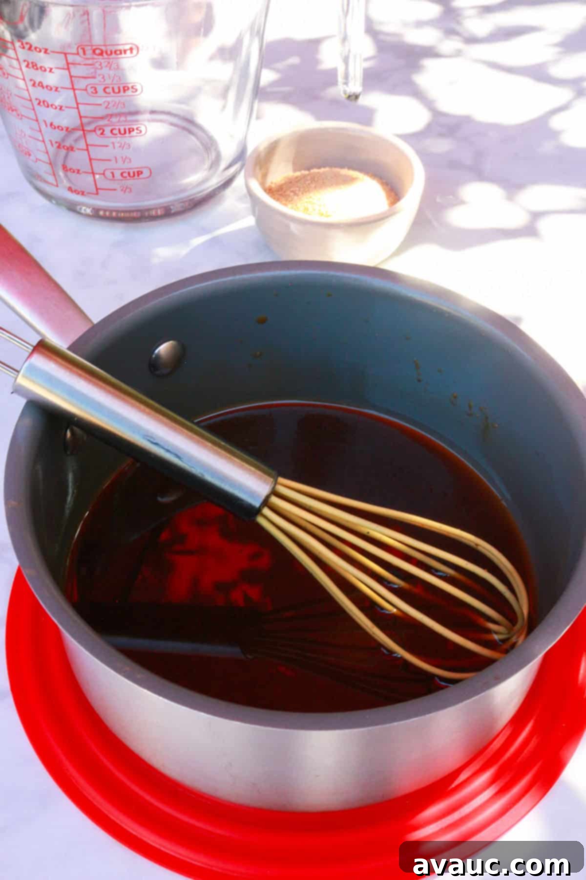 Strawberry Limeade 4 Image showing ingredients for simple syrup, with coconut sugar, water, and a small saucepan