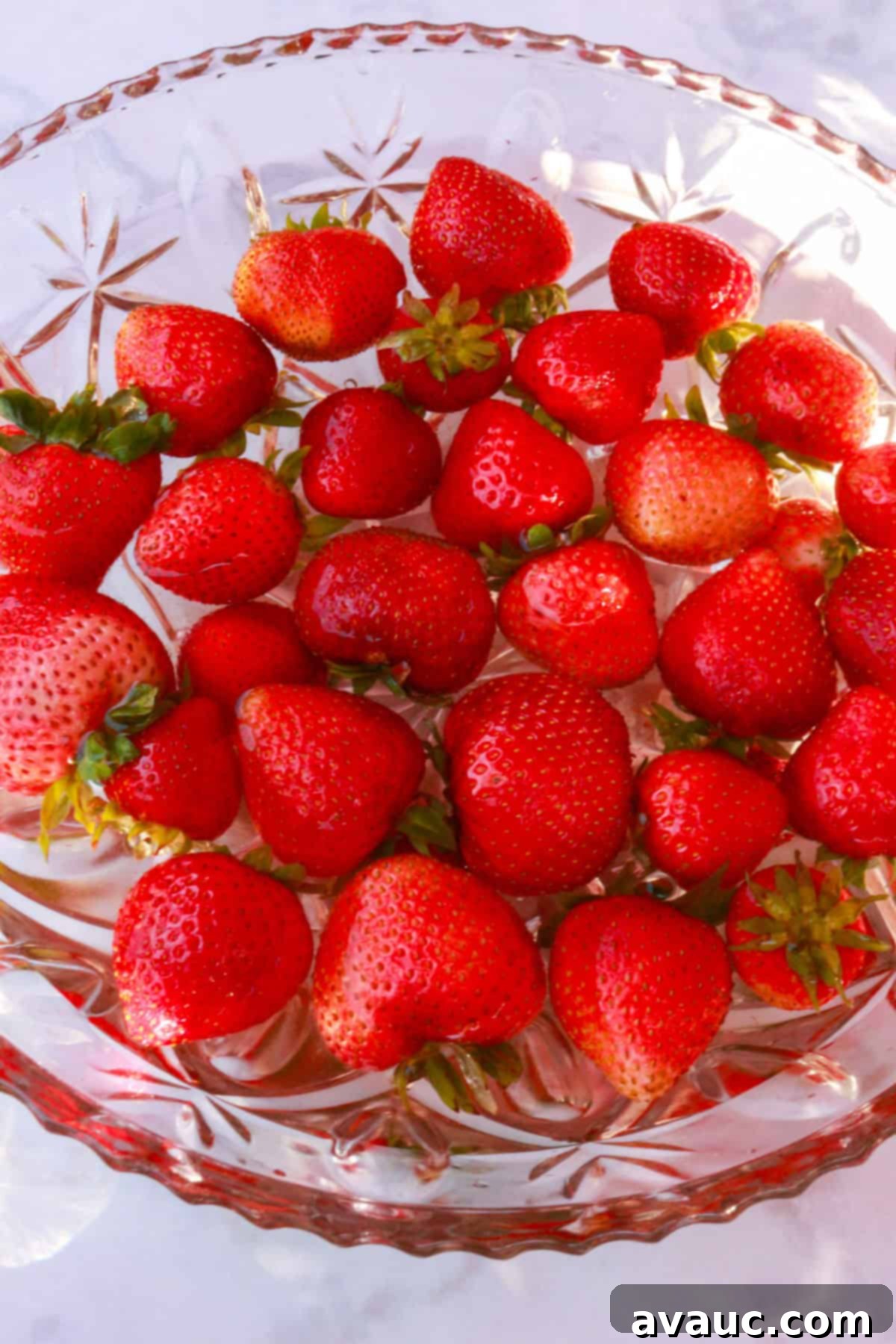 Strawberry Limeade 5 A bowl with water and fresh strawberries being washed