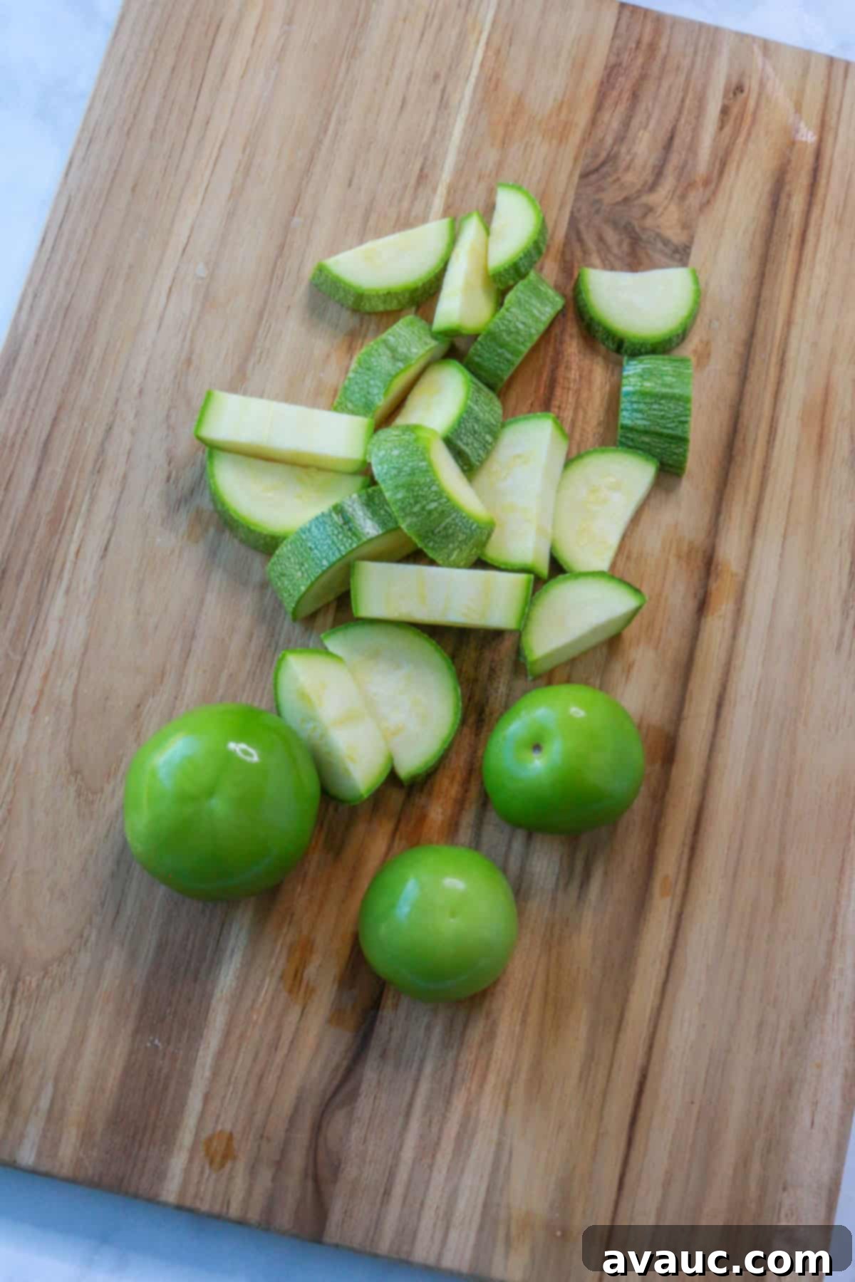 Mockamole 4 Husked tomatillos and chopped zucchini, ready for parboiling