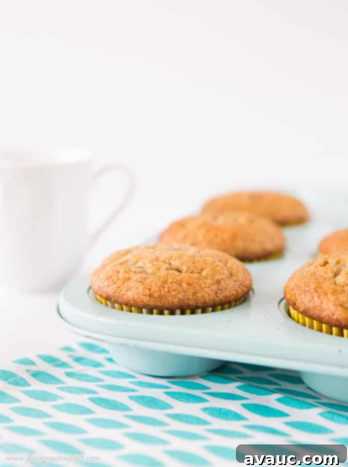 A close-up of beautifully overripe bananas with dark brown spots, perfect for mashing into a sweet banana muffin batter.