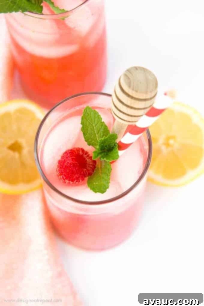 Add pureed raspberries to lemonade for a colorful and refreshing summer drink! Find the recipe for Homemade Raspberry Lemonade at Design Eat Repeat.