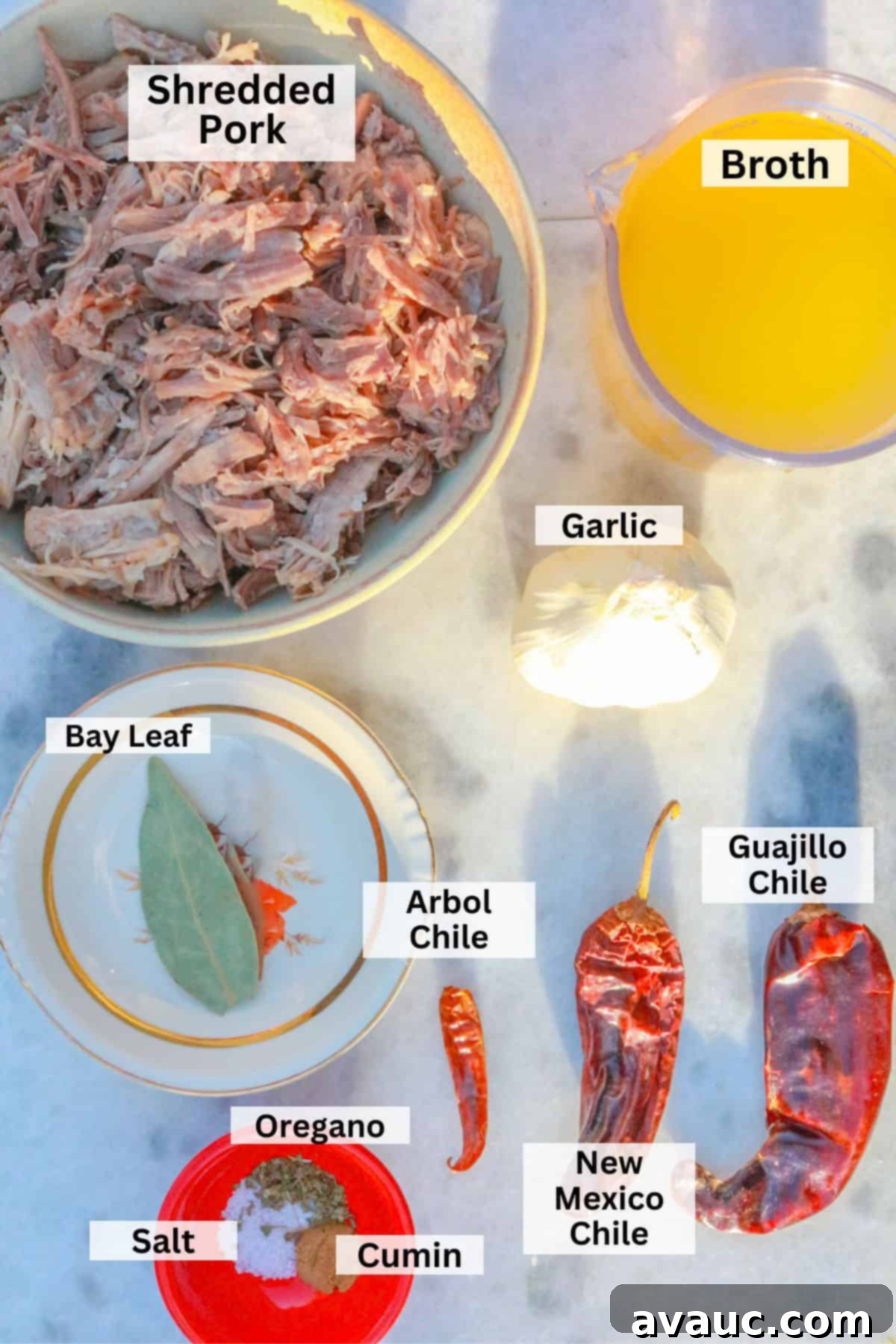 Red Chile Pork Tamales 3 Ingredient for chile colorado for tamales rojos: shredded pork, broth, garlic, bay leaf, cumin, salt, pepper, arbol chiles, guajillo chiles, New Mexico chiles