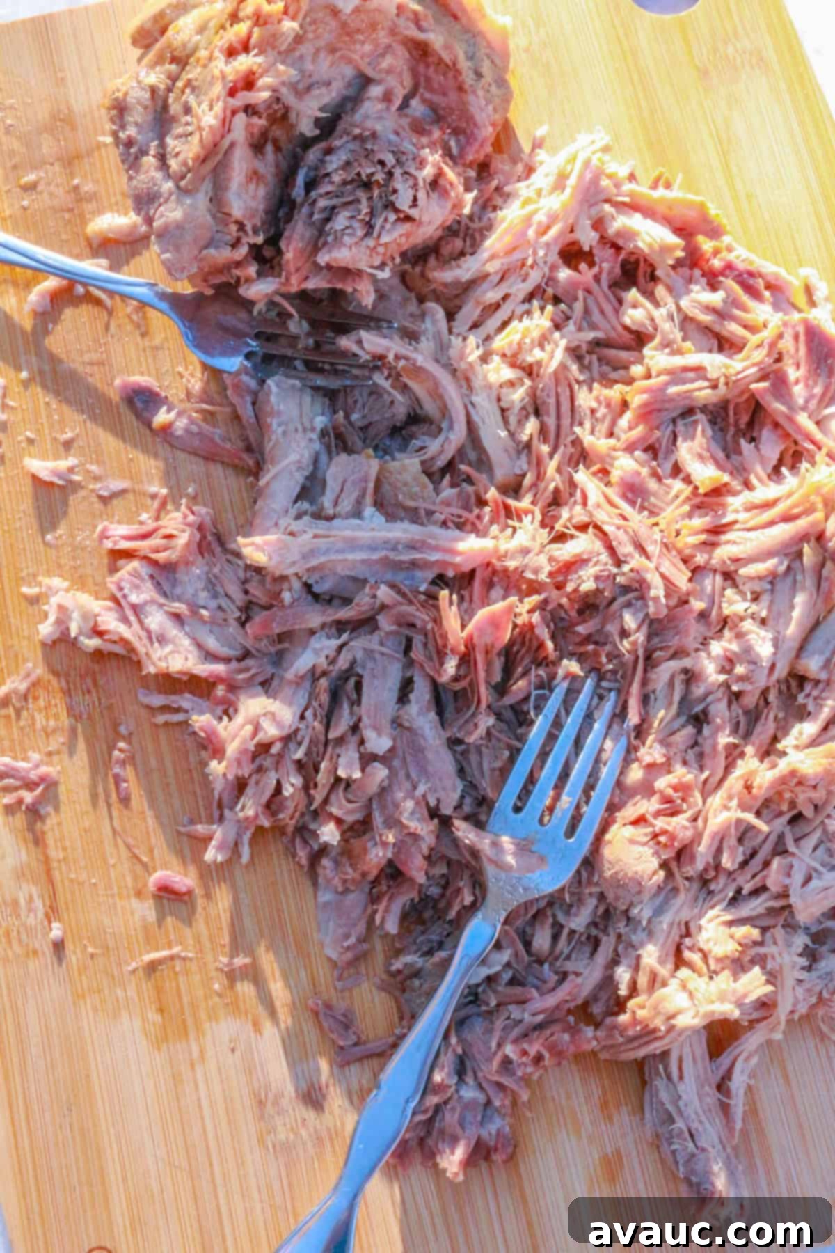 Red Chile Pork Tamales 6 Shredded pork on a cutting board