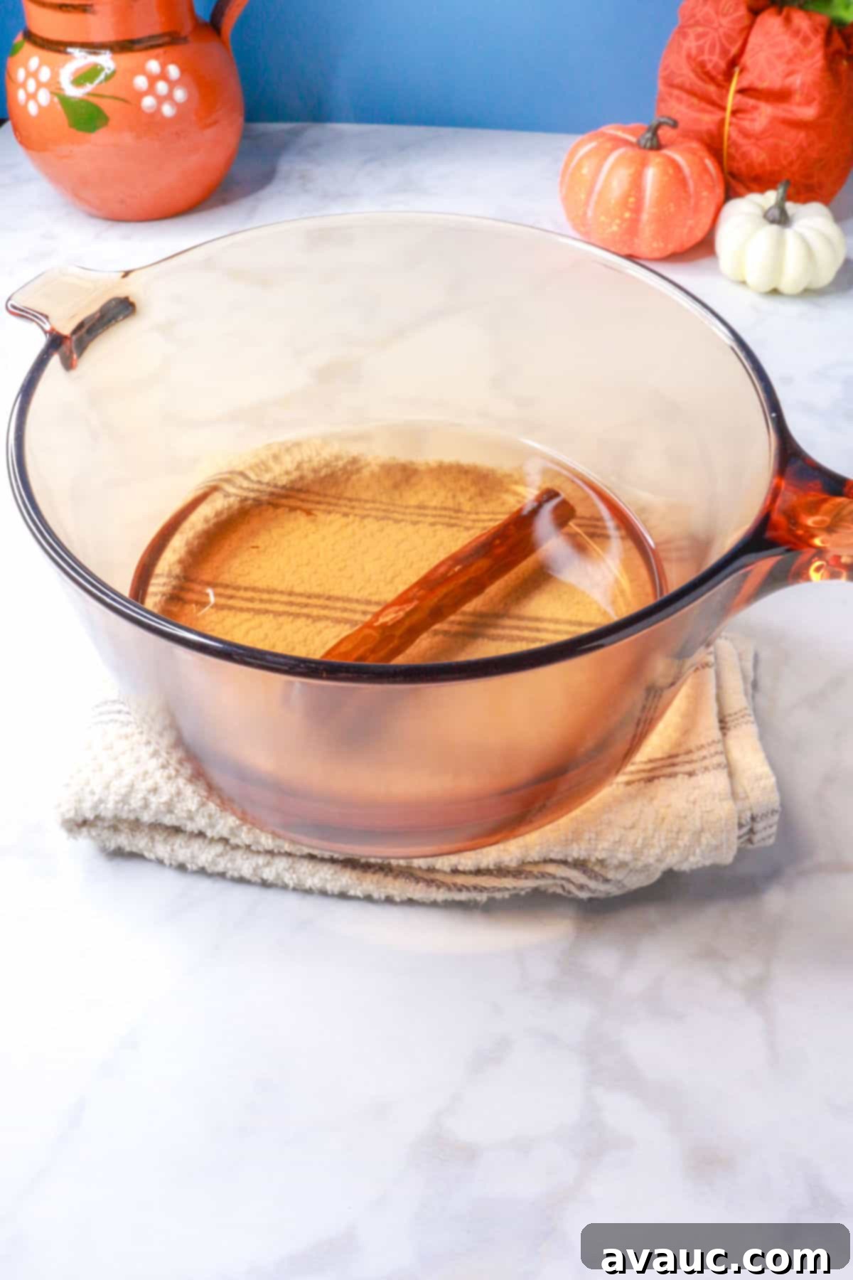 Cinnamon stick boiling in water