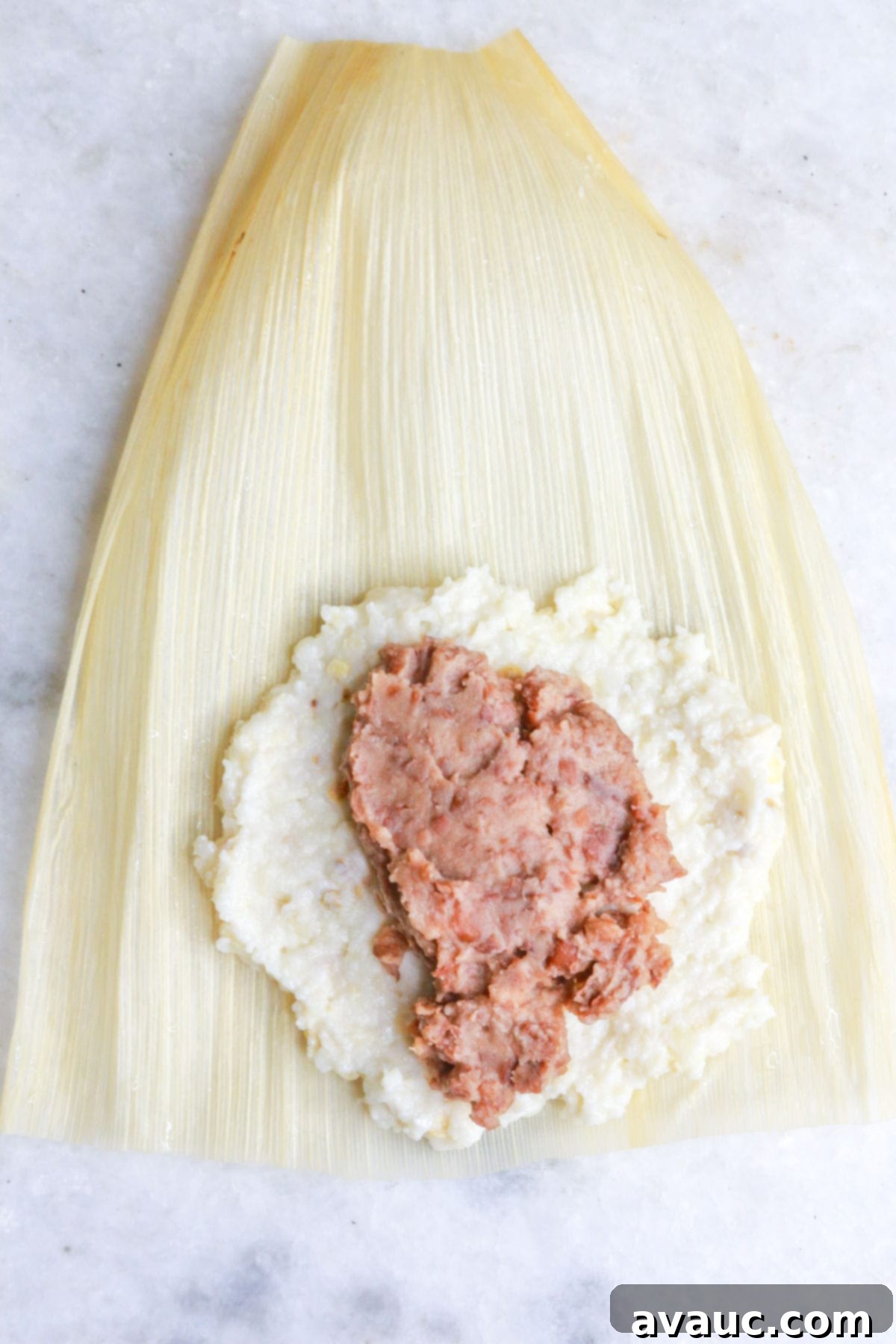 Savory Refried Bean Tamales 9 Corn husk with masa and refried beans to make tamales de frijol