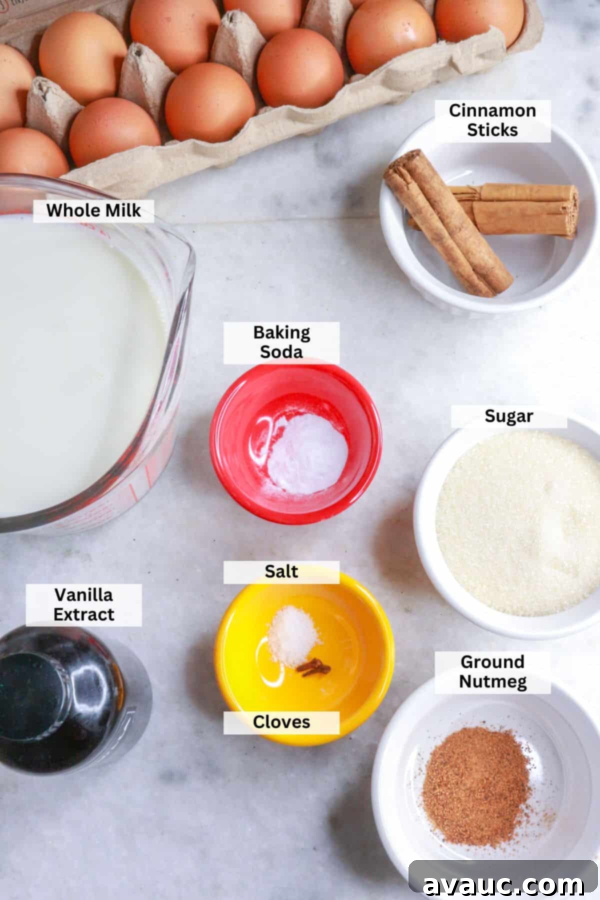 Rompope Mexicos Creamy Eggnog 3 Ingredients for rompope: eggs, milk, cinnamon sticks, baking soda, sugar, cloves, salt, nutmeg, vanilla extract laid out
