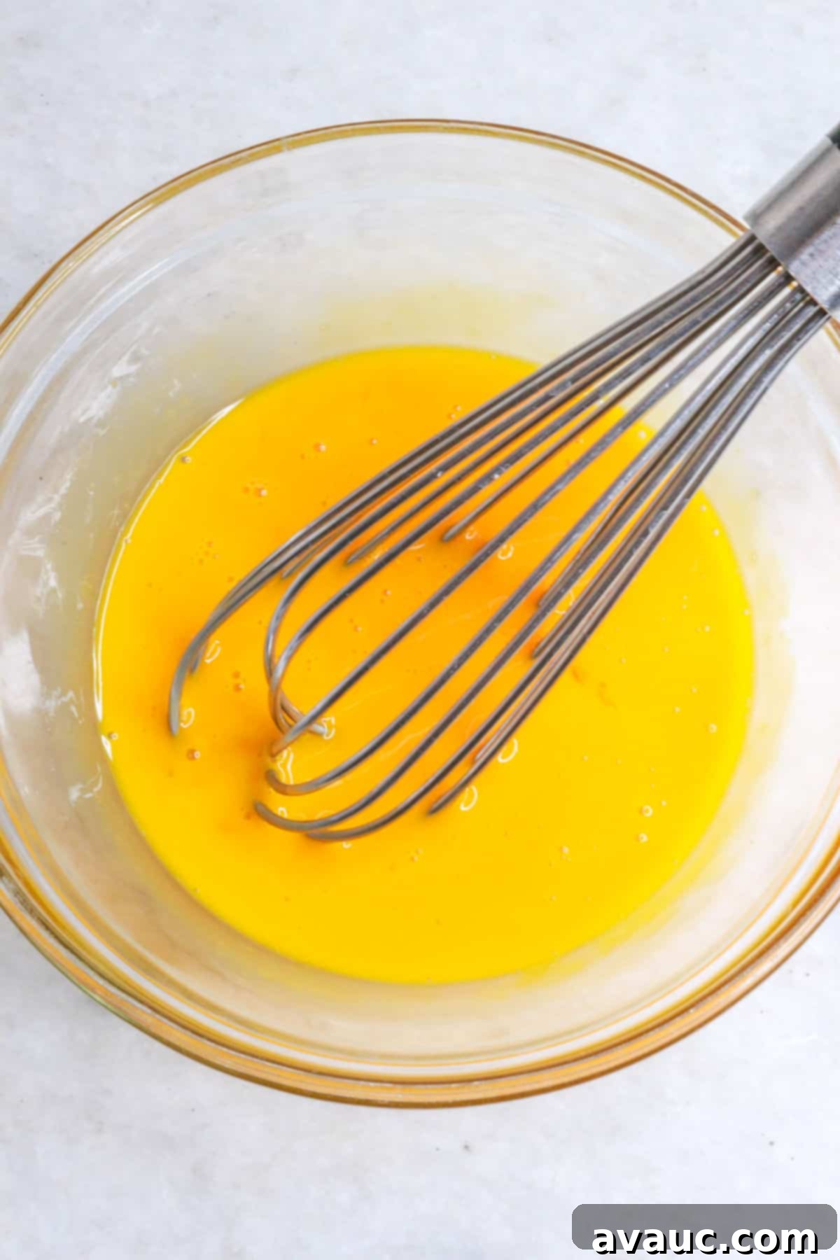 Rompope Mexicos Creamy Eggnog 6 Whisking egg yolks in a large bowl until light and frothy