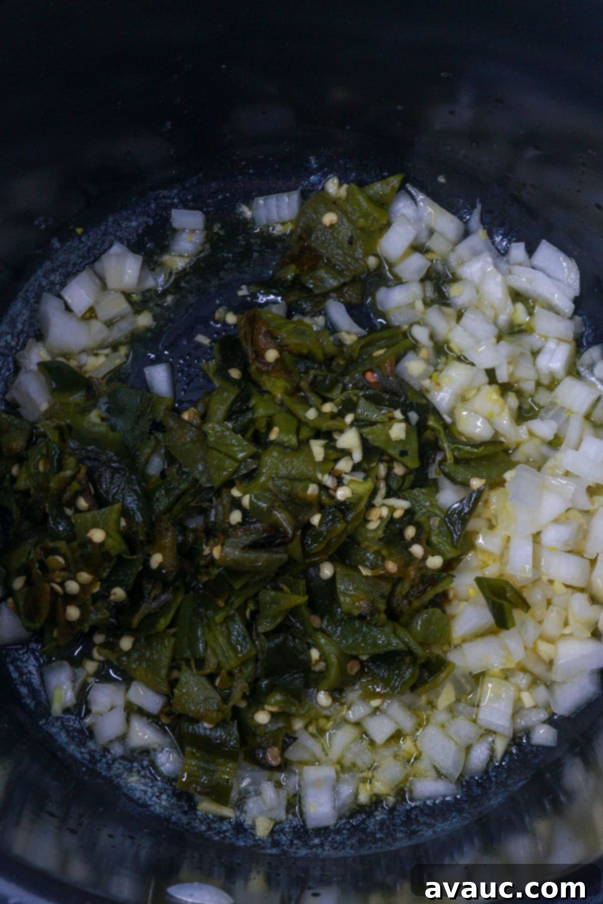 Hearty Poblano Soup: Dairy-Free Creaminess 7 Sautéing poblanos, garlic and onion in a pot