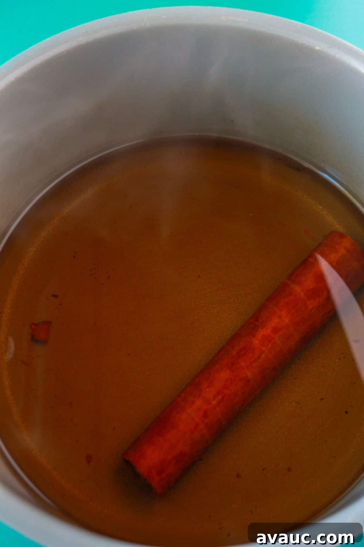 Creamy Rice Atole Dairy-Free Friendly 4 Cinnamon tea with a cinnamon stick in a pot