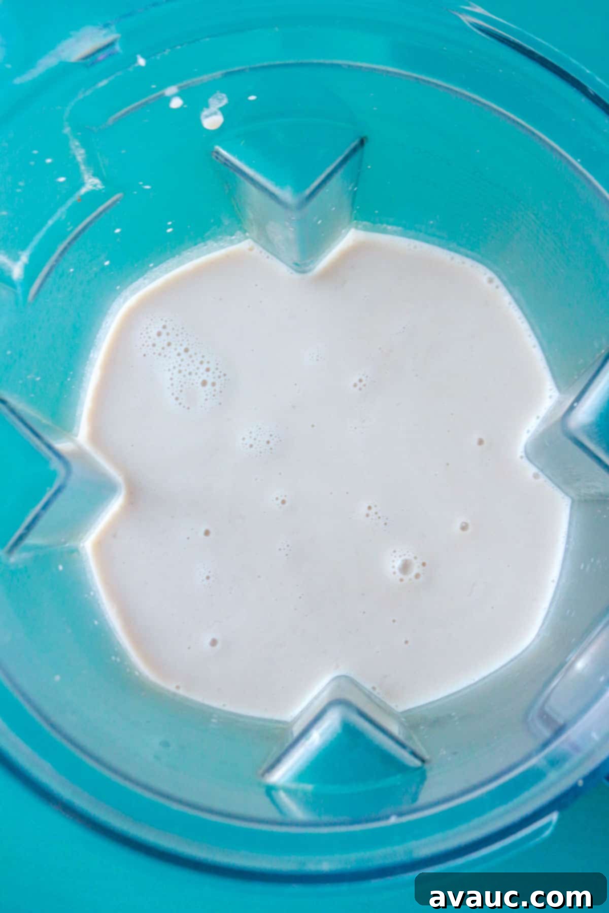 Creamy Rice Atole Dairy-Free Friendly 7 a blender with rice mixture and milk