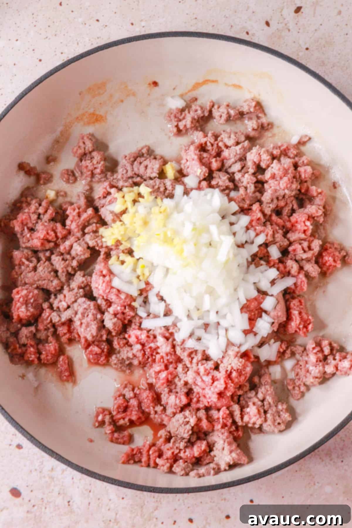 Browning beef with onion and garlic