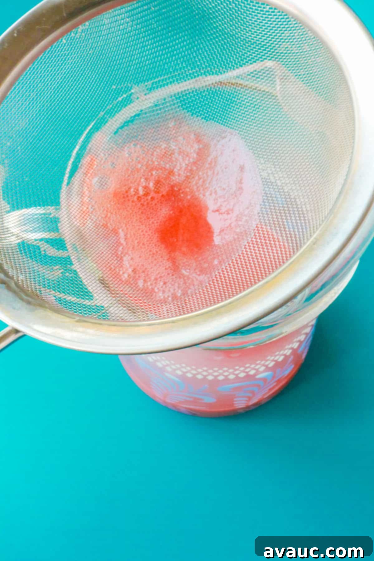 Fresh Strawberry Breeze 8 straining into pitcher