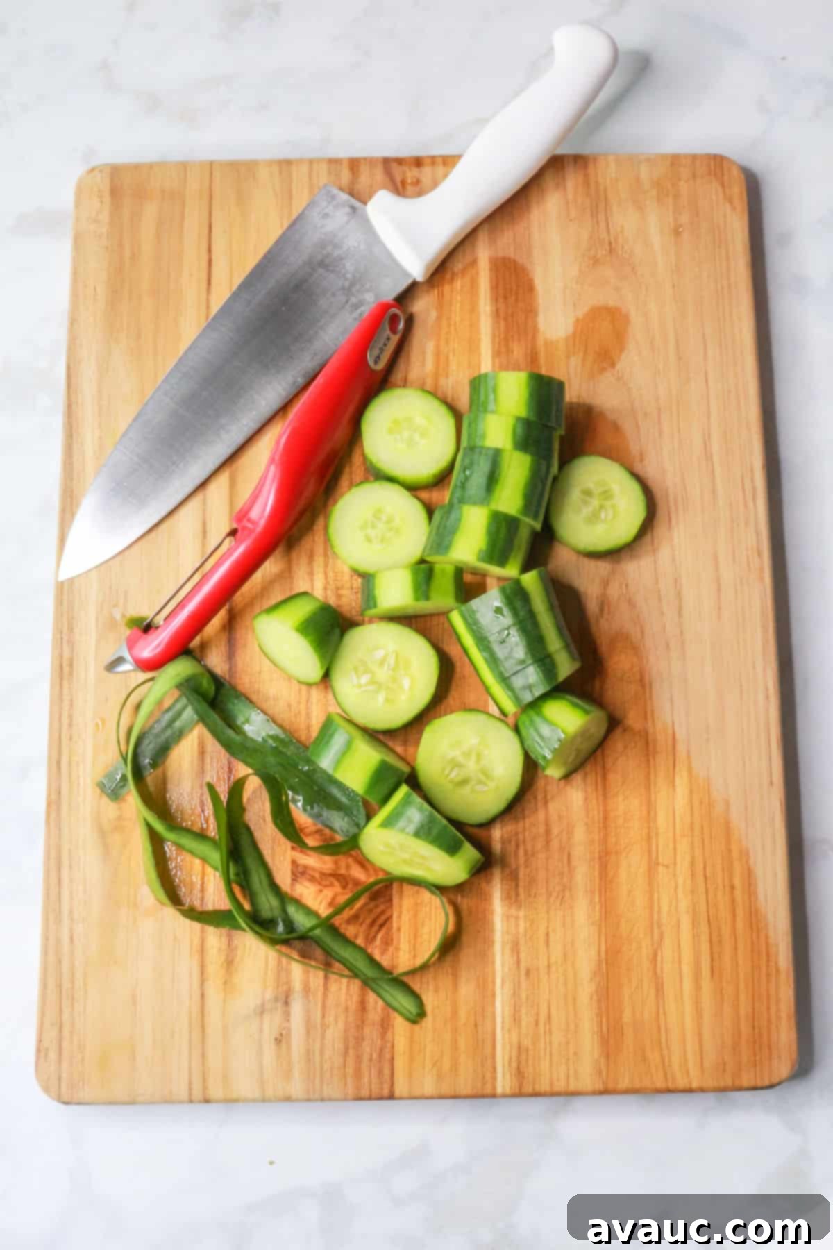 Crisp Pineapple Cucumber Agua Fresca 5 Freshly chopped cucumber pieces on a clean cutting board