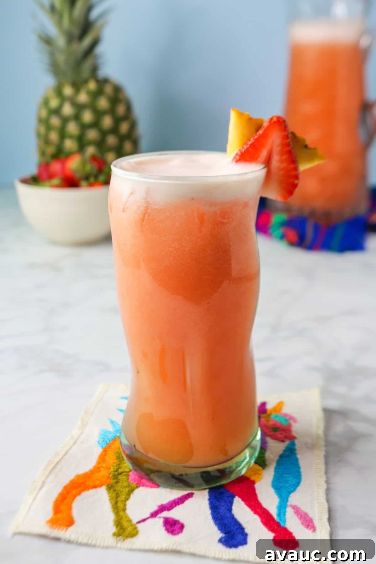 Pineapple Strawberry Oasis 12 Close-up of Pineapple Strawberry Agua Fresca in a glass