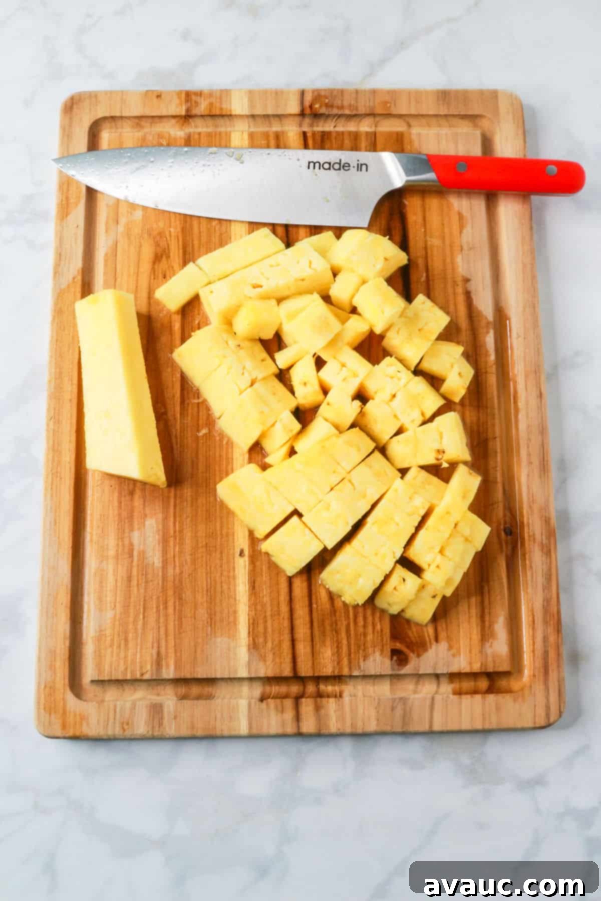 Pineapple Strawberry Oasis 7 Chopped pineapple on a cutting board