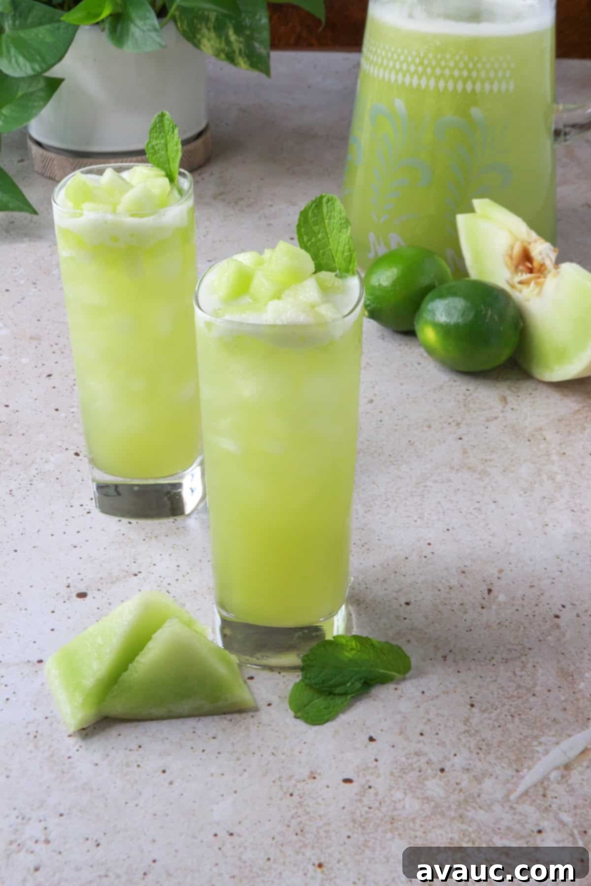 Honeydew Mint Agua Fresca 2 Two glasses of honeydew agua fresca with mint