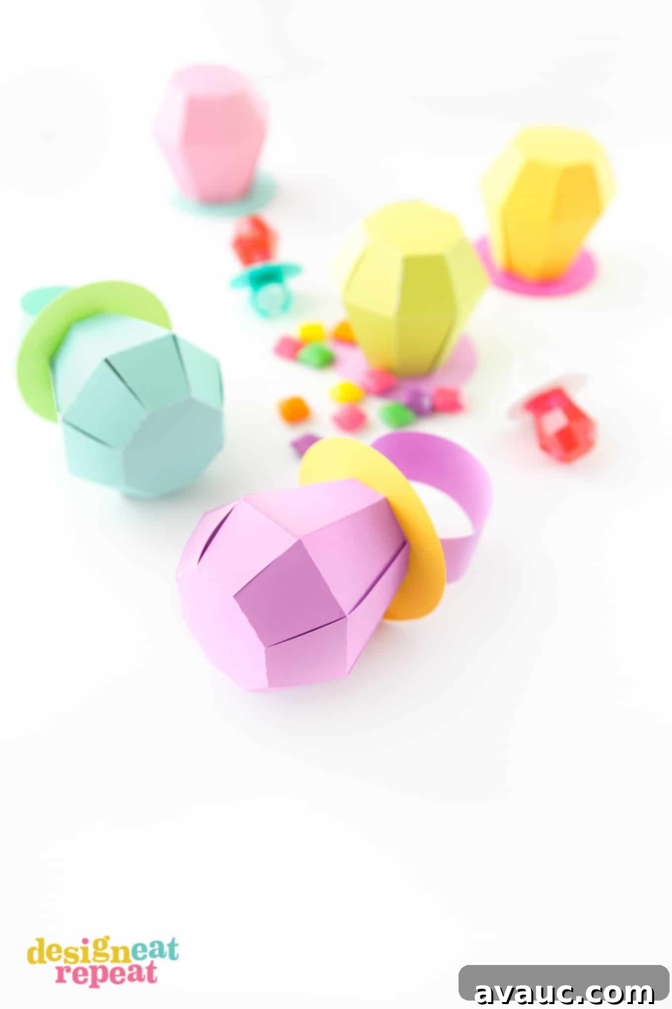 Assembling the gem part of the paper Ring Pop treat box, taping tabs closed.