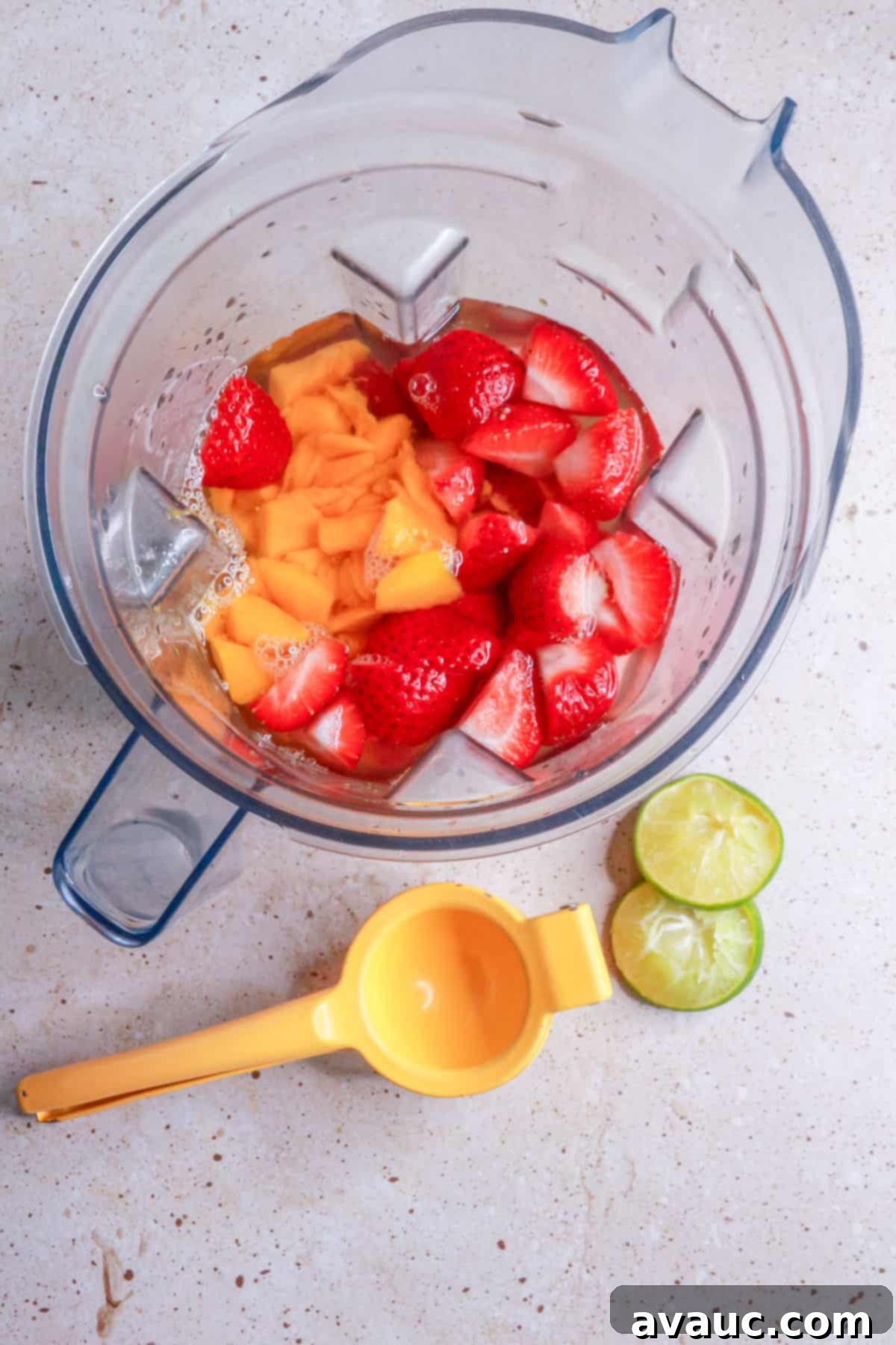 Ingredients for strawberry mango agua fresca in blender