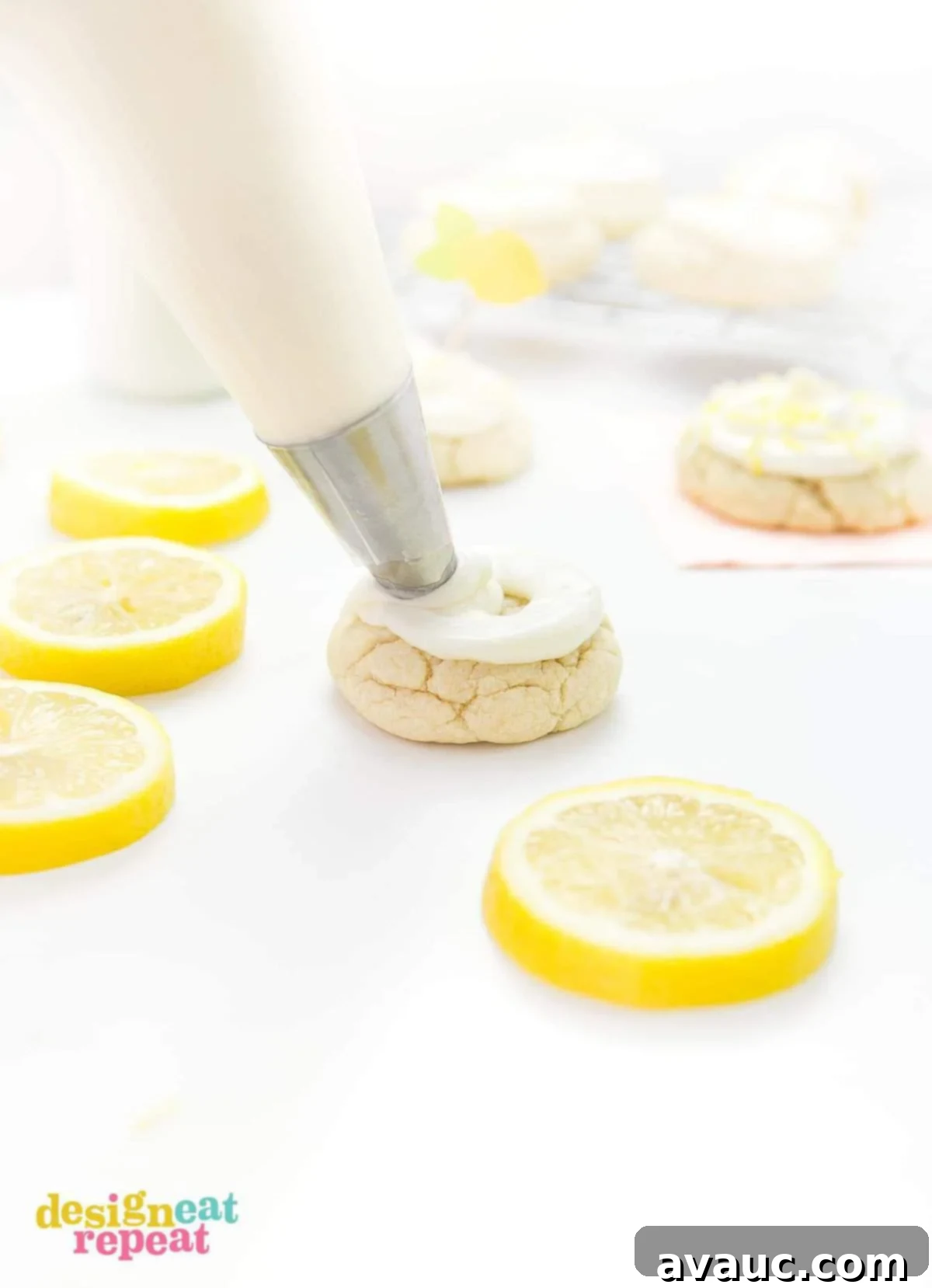 Luscious Lemon Cloud Cookies 5 Piping bag and tip creating a beautiful swirl of cream cheese frosting onto a thick lemon sugar cookie.