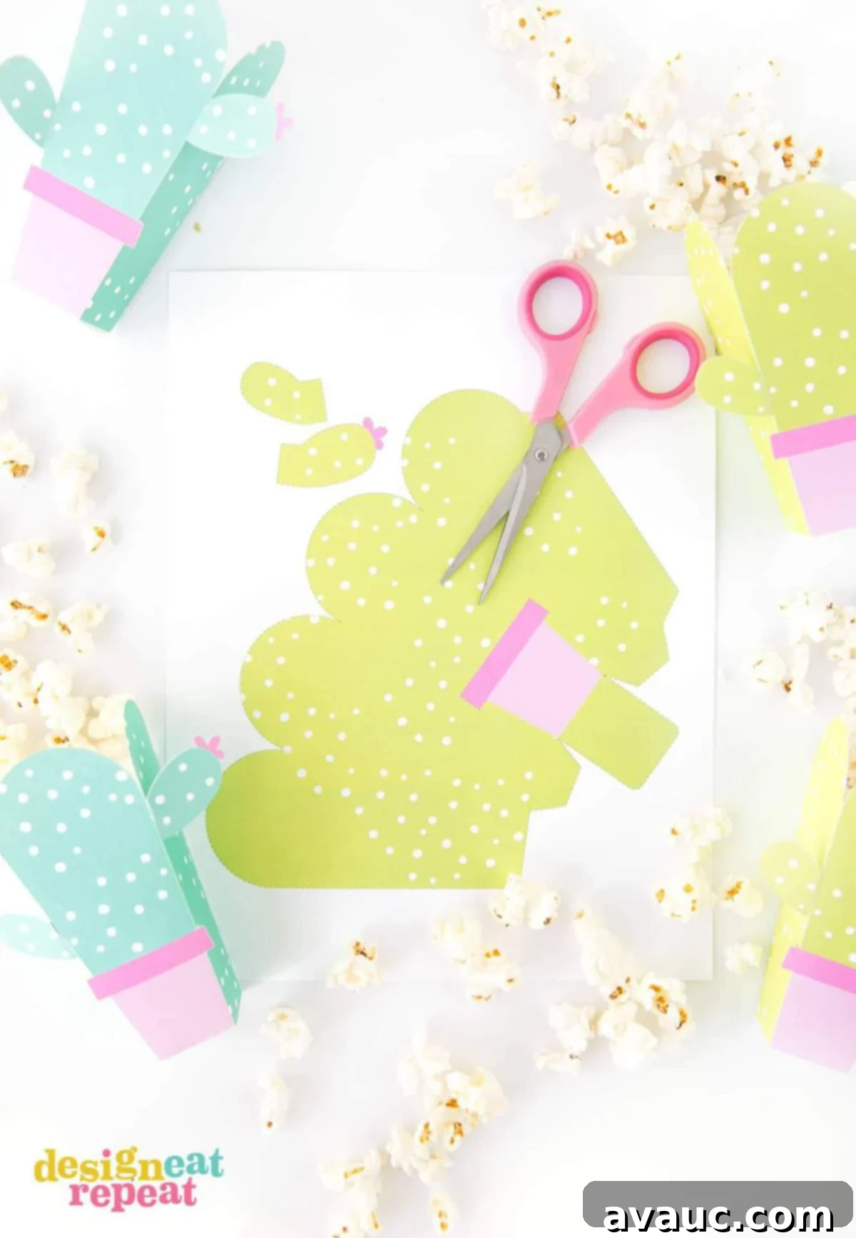 Materials needed to make DIY cactus popcorn boxes, including cardstock and cutting tools.