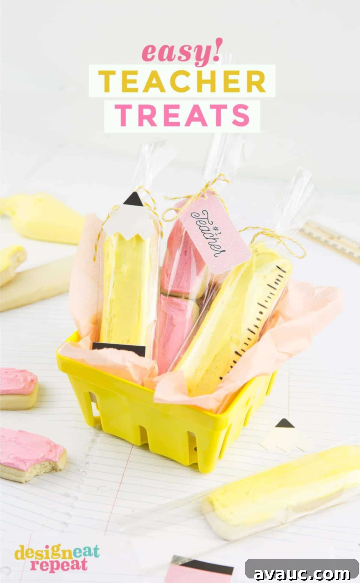 Sweet and Simple Teacher Appreciation Cookies 2 A charming yellow berry basket filled with homemade sugar cookie sticks, creatively decorated to resemble pencils, erasers, and rulers. Each treat is individually wrapped in a clear, food-safe bag, making them perfect teacher appreciation gifts.