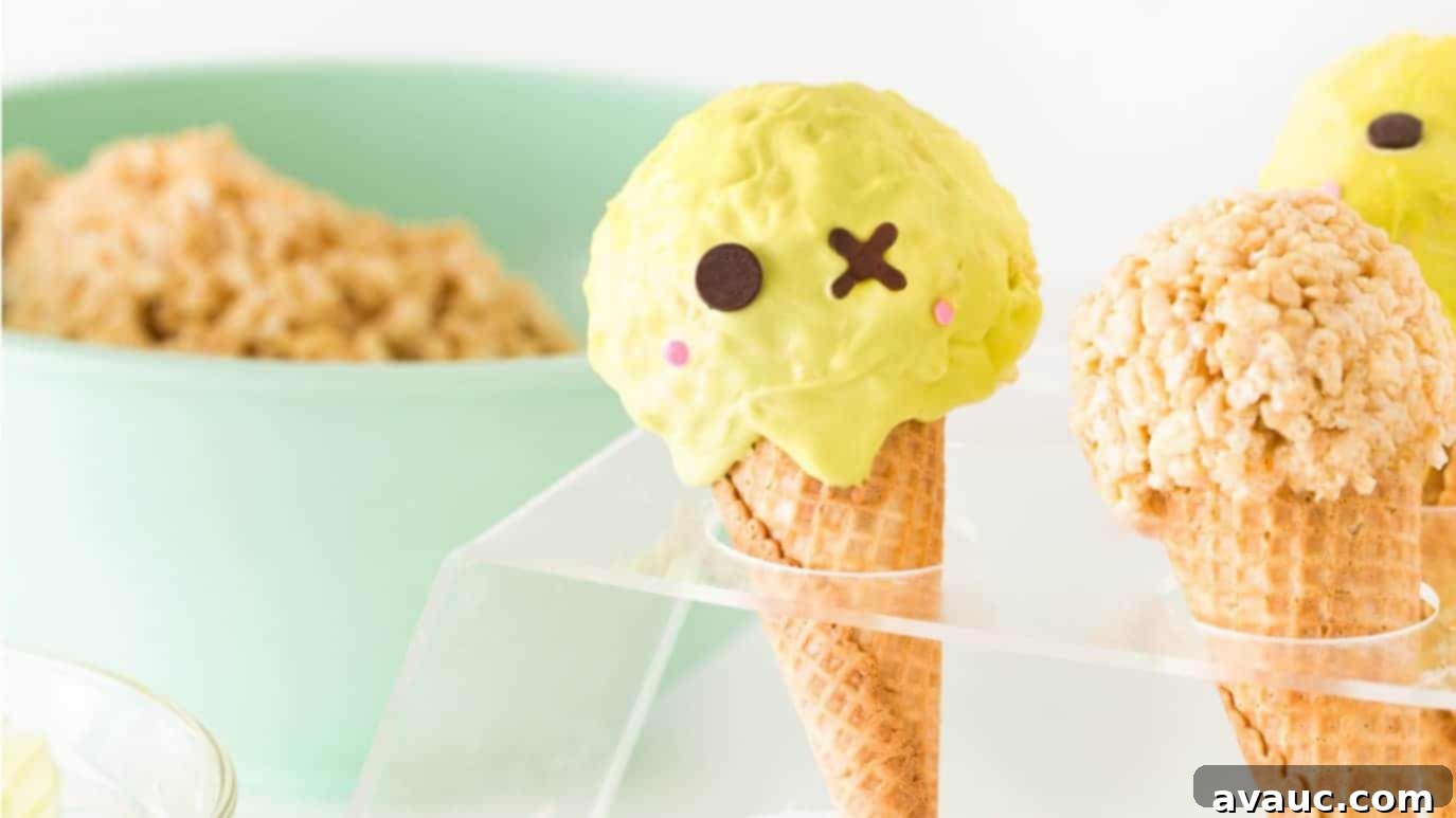 A close-up shot of an individual Cute Zombie Halloween Rice Krispie Treat, showcasing its friendly green face, chocolate eyes, and pink sprinkle cheeks, held in a cone.