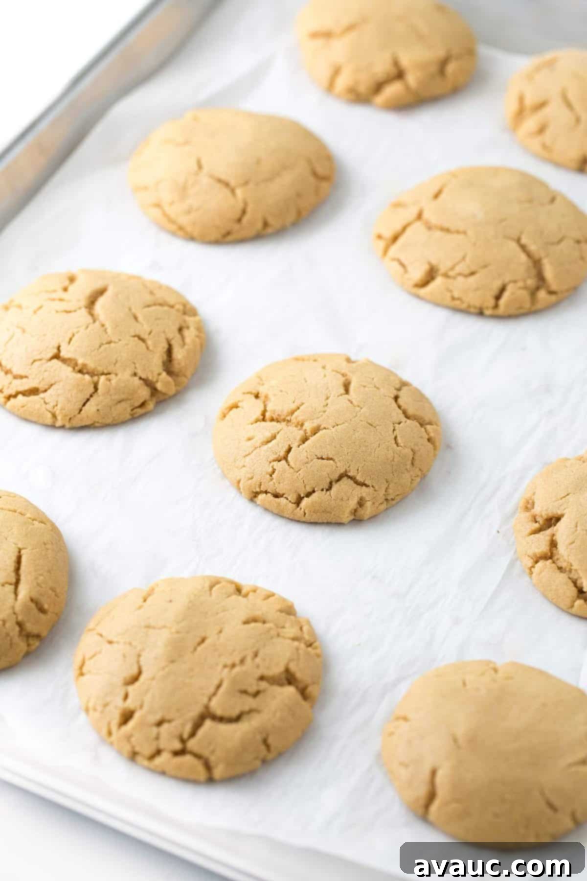 Design Your Own Simple Spooky Cookies 5 Cookie dough rolled into balls and flattened, preparing for white chocolate peanut butter cups.