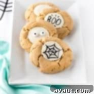 Design Your Own Simple Spooky Cookies 9 Delicious white chocolate peanut butter cup cookies, decorated for Halloween.