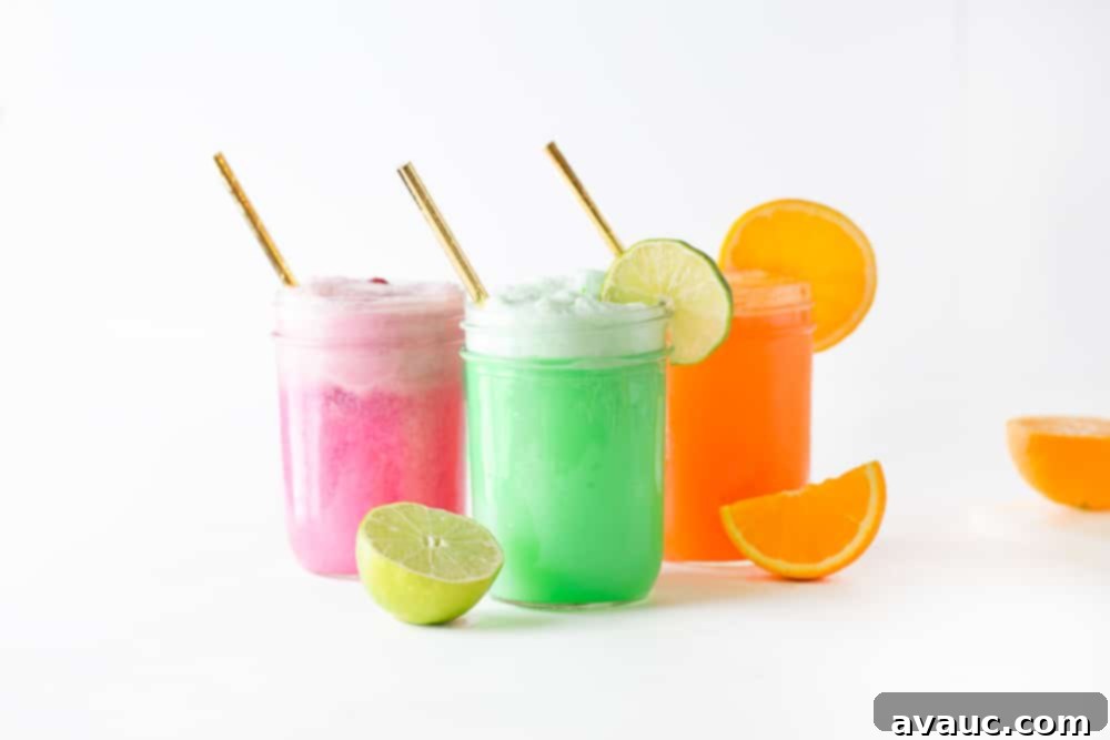 Individual mason jars featuring scoops of raspberry, lime, and orange sherbet, ready for a colorful DIY Punch Bar.