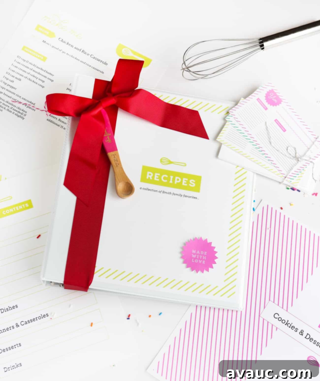 A beautifully organized DIY recipe binder with custom cover and neatly arranged pages.