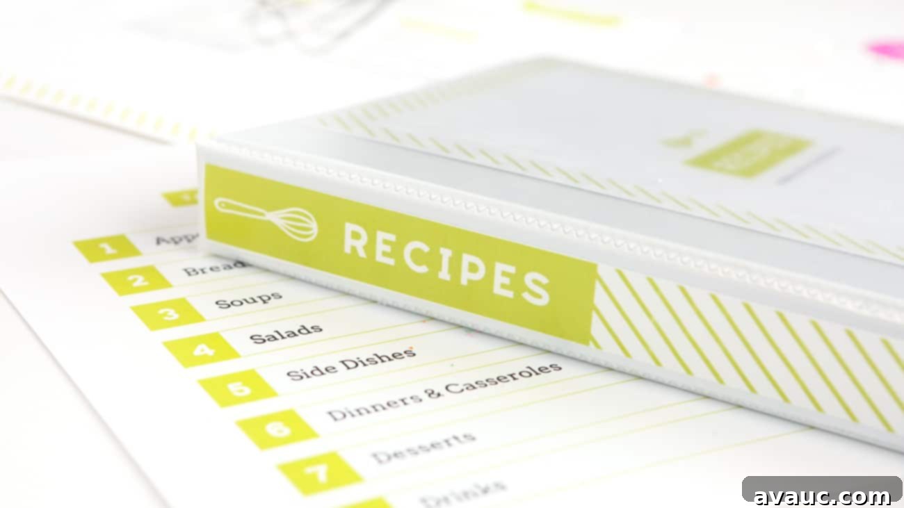 Close-up of a DIY recipe binder showing custom tabs and dividers.