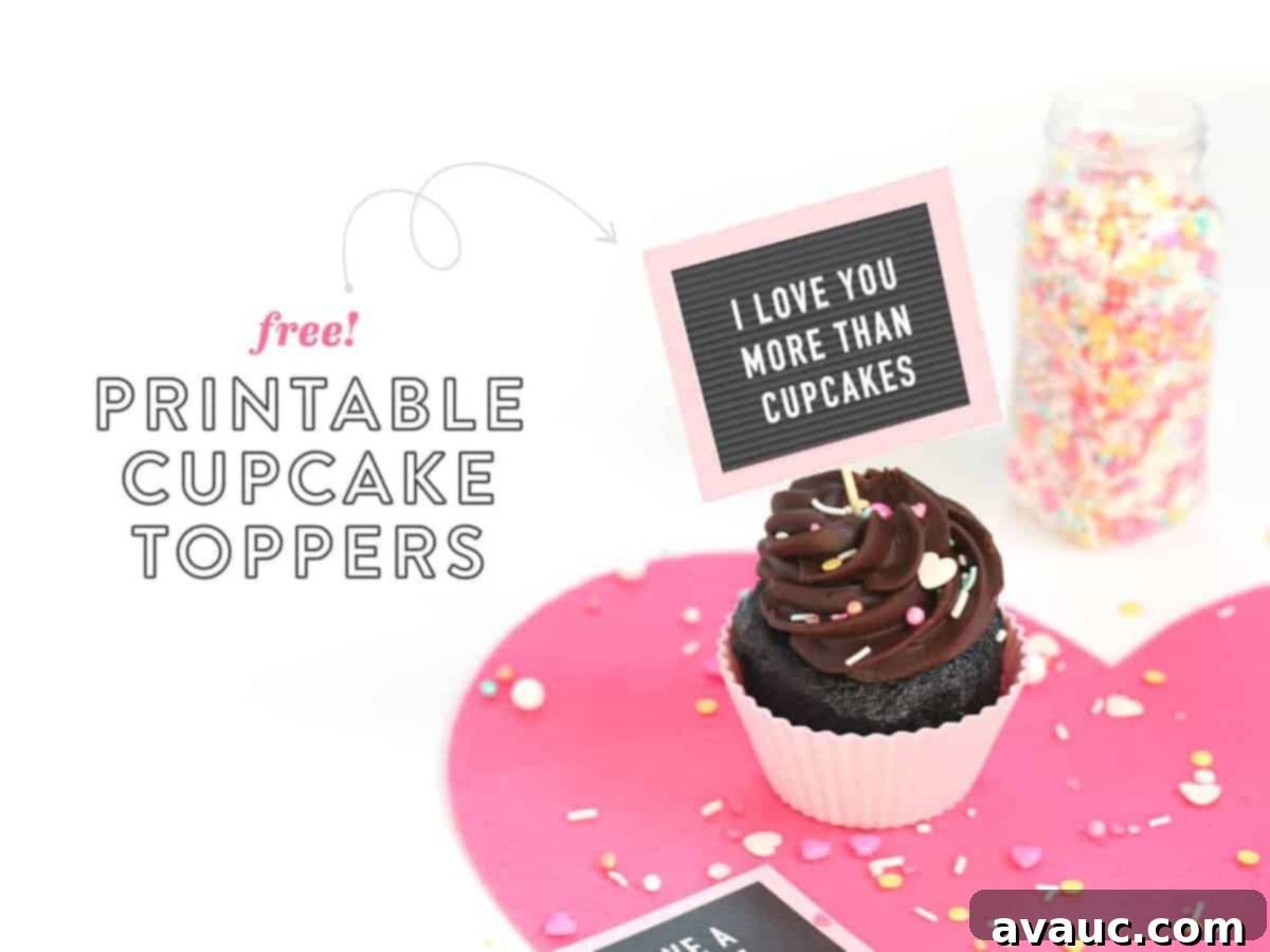 Chocolate cupcakes with Free Printable Valentine Cupcake Toppers - mini pink letterboards! Have a Sweet Valentine's Day and I Love You More Than Cupcakes Phrases
