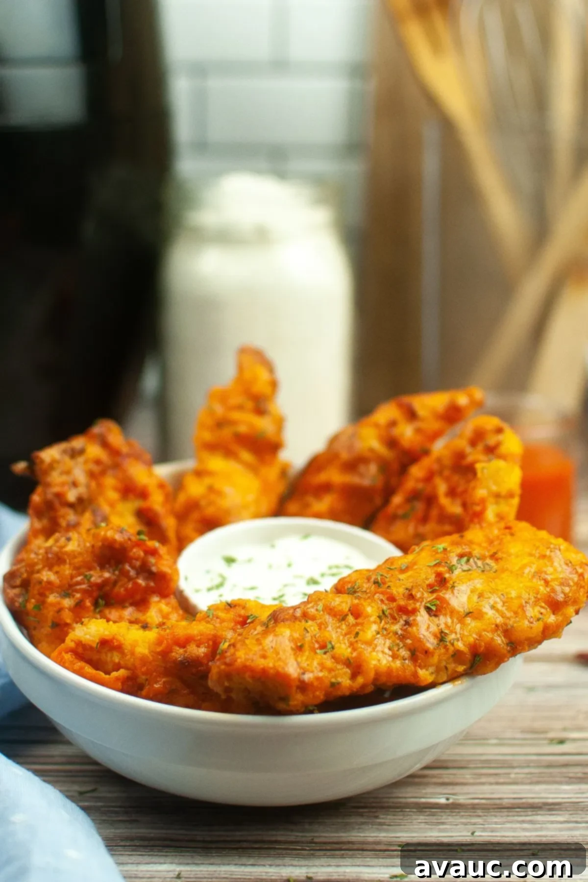 A vibrant bowl of Air Fryer Buffalo Chicken Tenders, ready to be enjoyed.